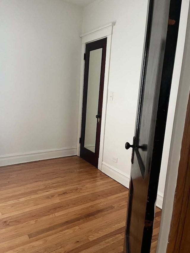 unfurnished room featuring light wood-type flooring