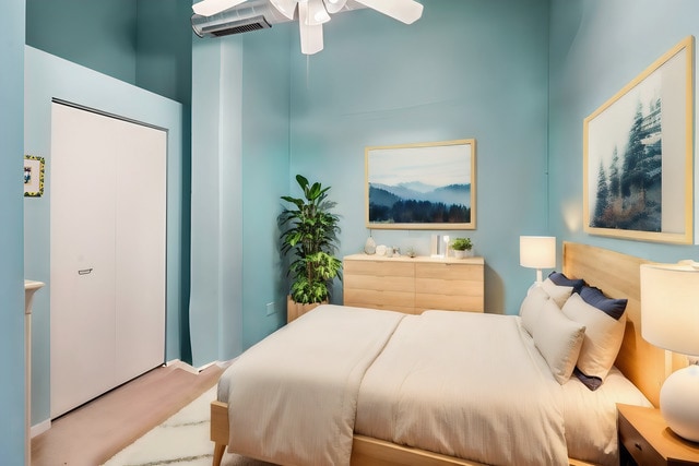 bedroom featuring visible vents and ceiling fan