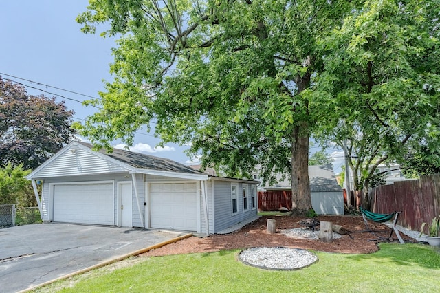 garage with a lawn