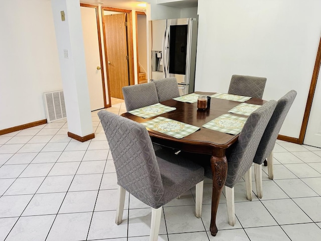 dining room featuring light tile patterned floors