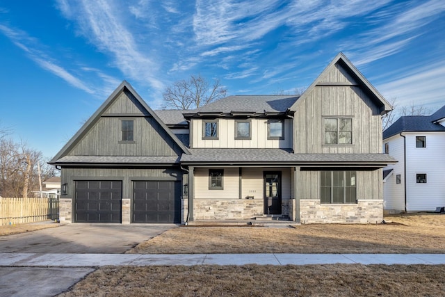 view of front of house with a garage and a porch