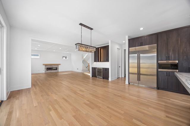 unfurnished living room featuring light hardwood / wood-style floors