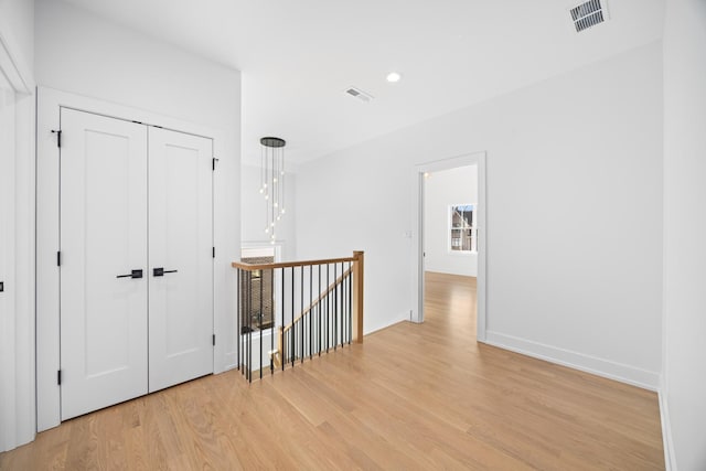 hallway featuring light hardwood / wood-style floors