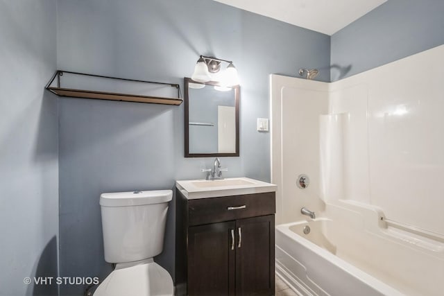 full bathroom featuring vanity, toilet, and bathing tub / shower combination