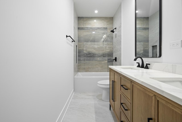 full bathroom with vanity, toilet, and tiled shower / bath combo