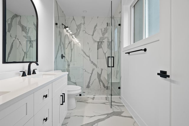 bathroom featuring an enclosed shower, vanity, and toilet