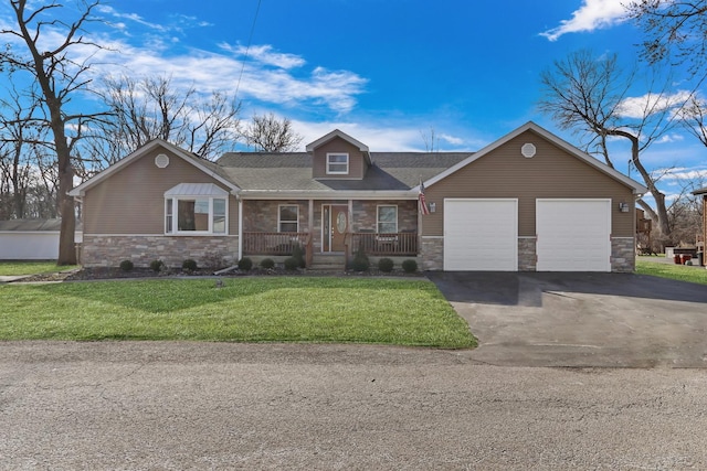 view of front of home with stone siding, aphalt driveway, an attached garage, covered porch, and a front lawn