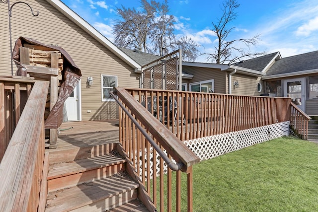 wooden terrace with a yard