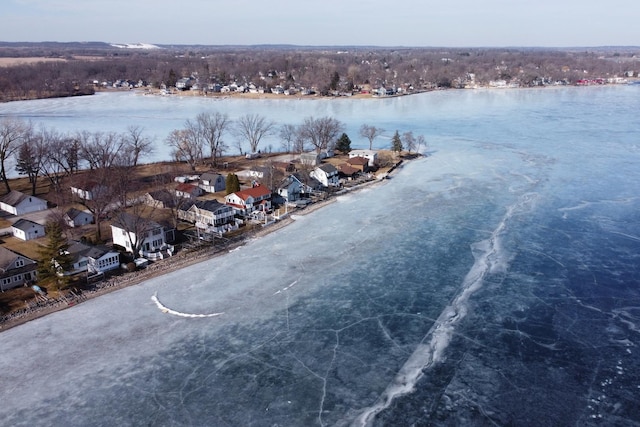 birds eye view of property featuring a water view and a residential view