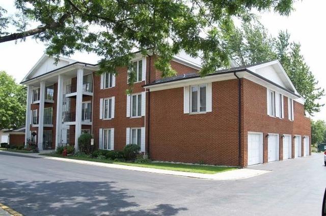 view of property featuring a garage