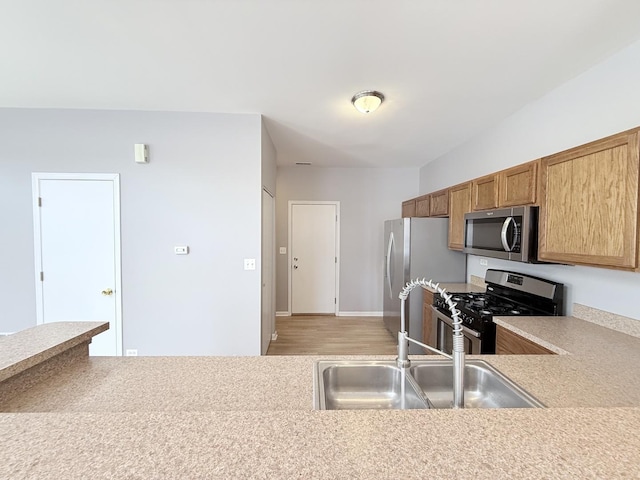 kitchen with stainless steel appliances and sink