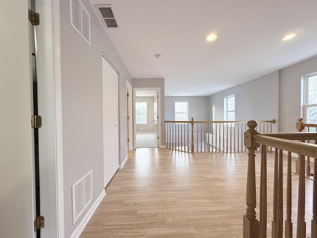 corridor featuring light wood-type flooring