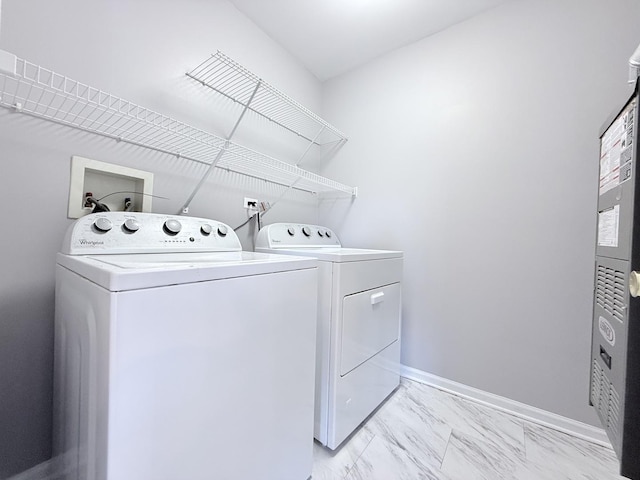 clothes washing area with independent washer and dryer