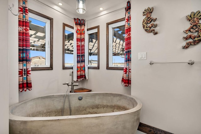 bathroom featuring sink and a bathtub