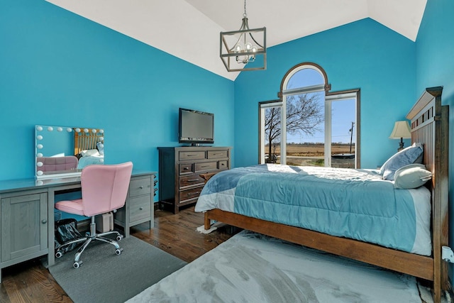 bedroom with vaulted ceiling, an inviting chandelier, and dark hardwood / wood-style flooring