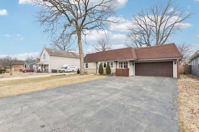 single story home featuring a garage