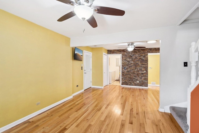 unfurnished living room featuring light hardwood / wood-style flooring