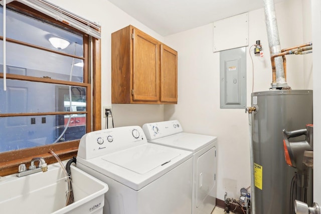 clothes washing area featuring water heater, separate washer and dryer, sink, cabinets, and electric panel