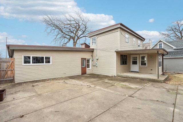 rear view of property featuring a patio