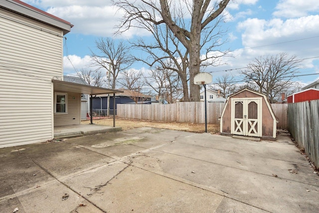 view of patio / terrace with a storage shed