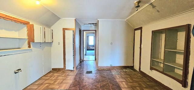 hallway featuring vaulted ceiling and dark parquet floors