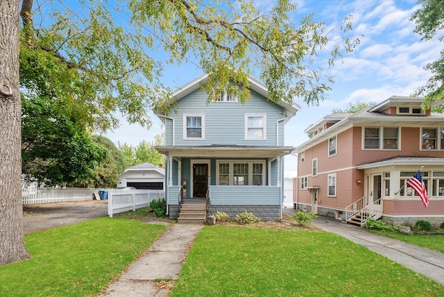 view of front of property featuring a front yard and a porch