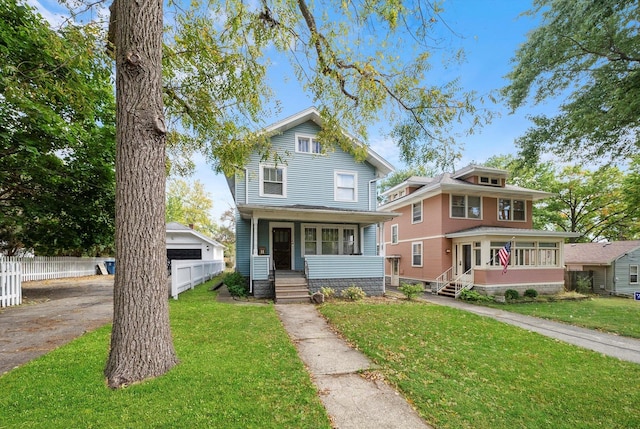 view of front of property featuring a front lawn and covered porch