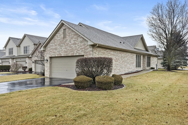 view of property exterior featuring a garage and a lawn