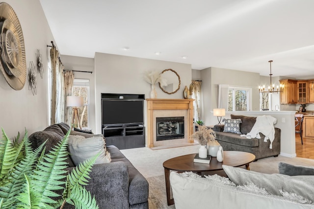 living room with an inviting chandelier