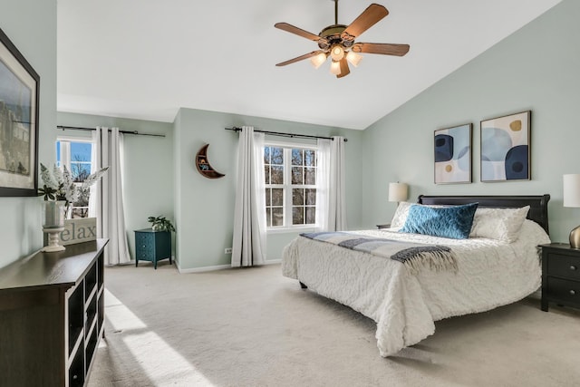 carpeted bedroom with lofted ceiling and ceiling fan