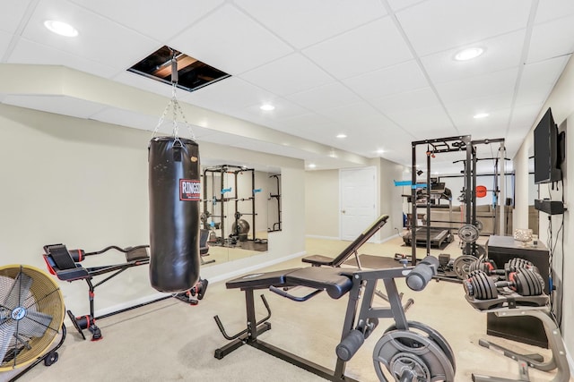 workout room featuring a paneled ceiling