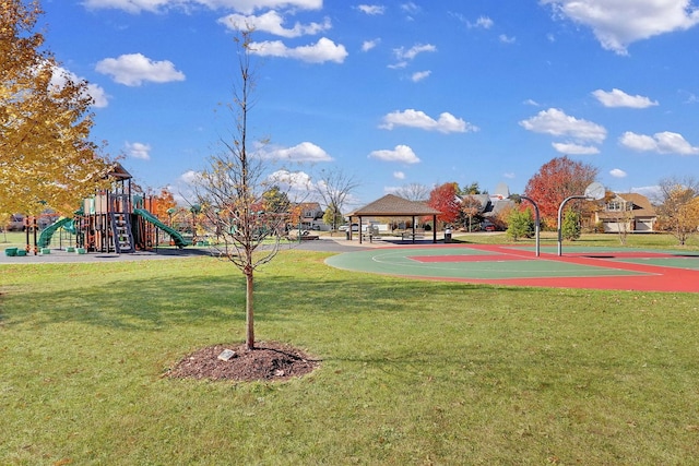 view of sport court with a playground, a gazebo, and a lawn