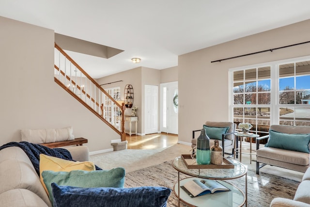 carpeted living room featuring a healthy amount of sunlight