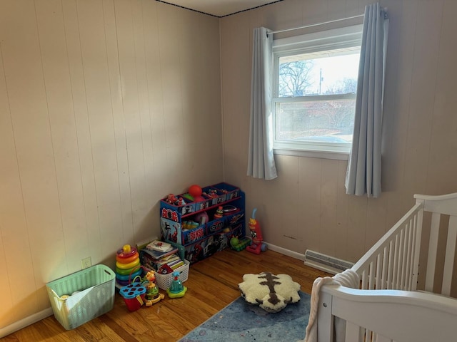 bedroom featuring wood-type flooring