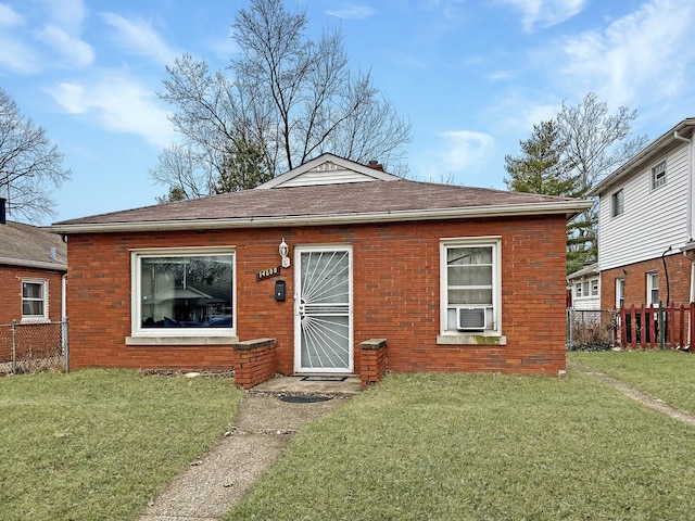 view of front of property with a front lawn