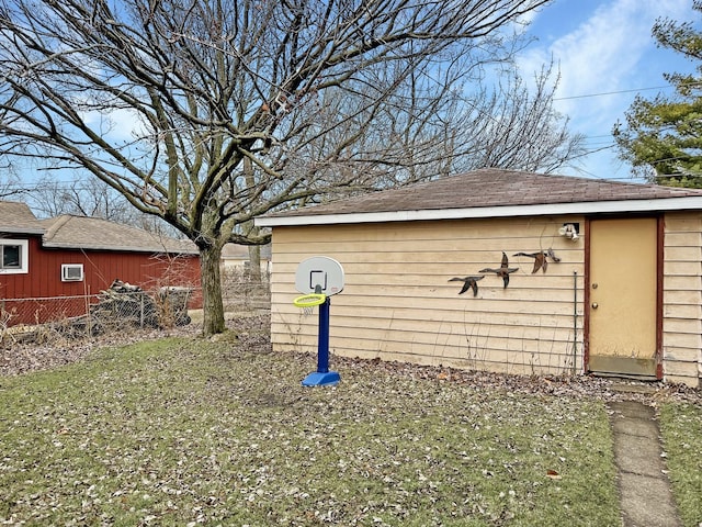 view of outbuilding featuring a yard