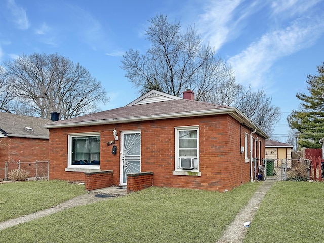 view of front of house with a front lawn