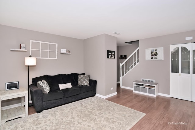 living room with hardwood / wood-style flooring