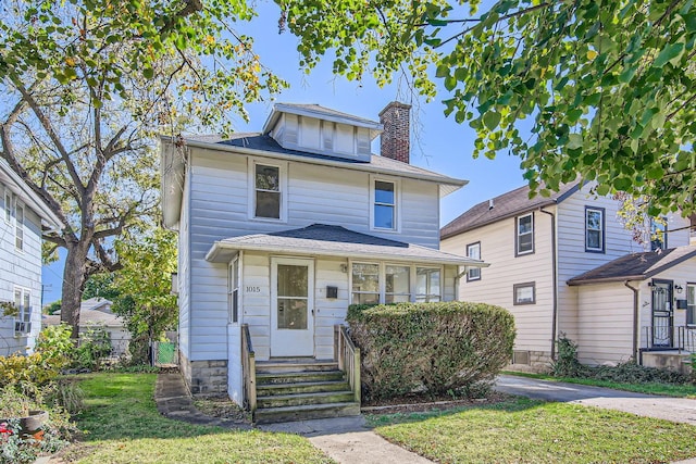 front facade with a front lawn