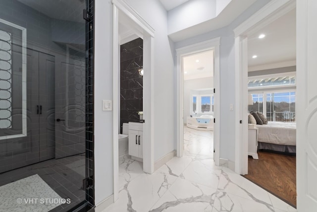 bathroom with a shower with shower door