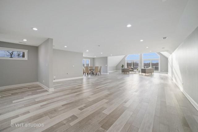 unfurnished living room with light hardwood / wood-style flooring