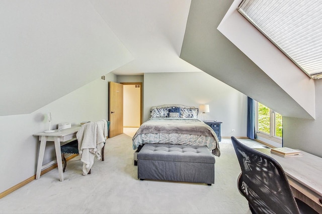 carpeted bedroom with vaulted ceiling