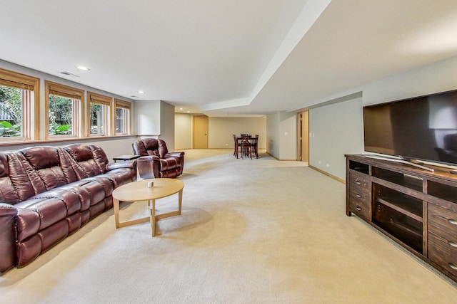 living room featuring light carpet