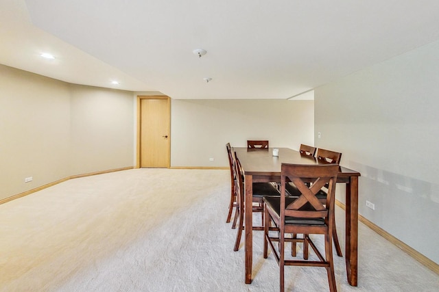 view of carpeted dining space