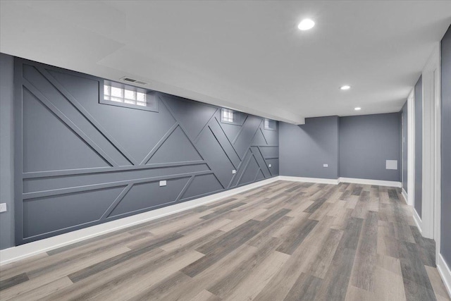 basement with wood-type flooring