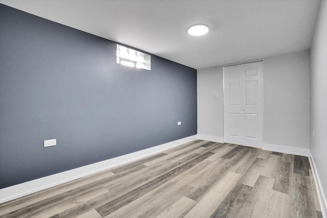 basement with light wood-type flooring