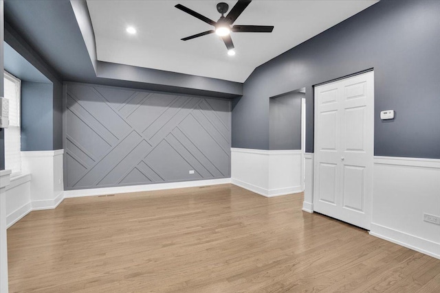 unfurnished room featuring ceiling fan and light hardwood / wood-style flooring