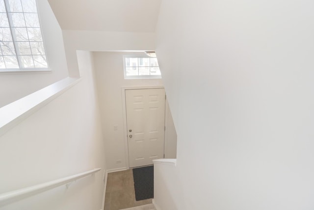 entryway with carpet floors