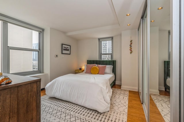 bedroom with light hardwood / wood-style floors