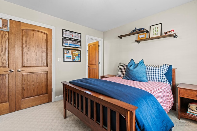 bedroom with light colored carpet